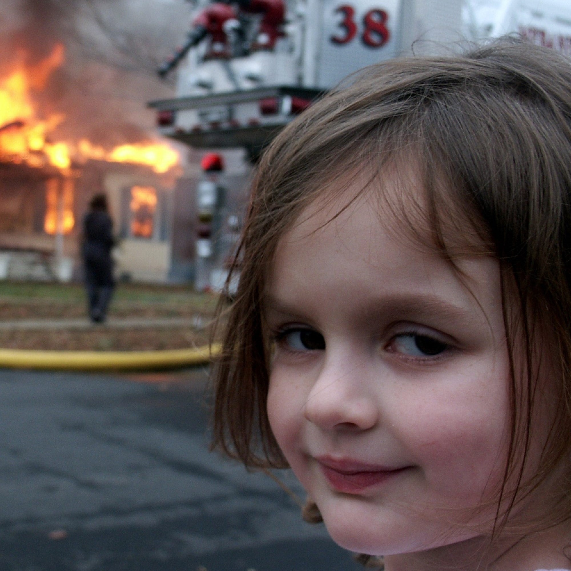 girl burning house.jpg